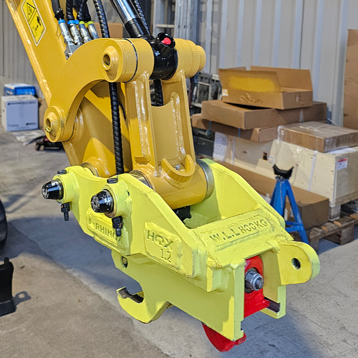 1.5T Fabricated Quick Hitch Lifestyle Image 3 - mounted on a digger arm